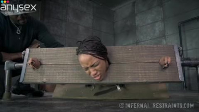 Restrained ebony hoe gets her pussy punished