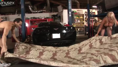 Big breasted blondie gets fucked from behind by a horny mechanic