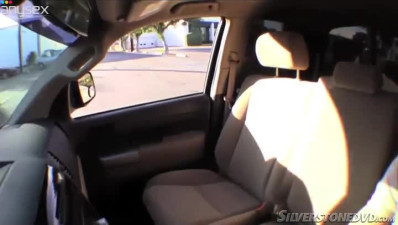 Kinky girl gives a head in a car