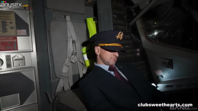 Two sexy chicks play with a pilot's monster cock right in the airplane