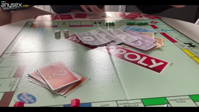 A brunette baddie loses in a monopoly game, having to please a cock afterwards