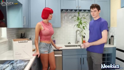 Voluptuous redhead bombshell seduces young hunk and rides his cock