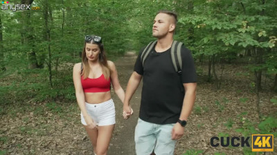 Outdoor threesome with a breathtaking lady who takes two dicks